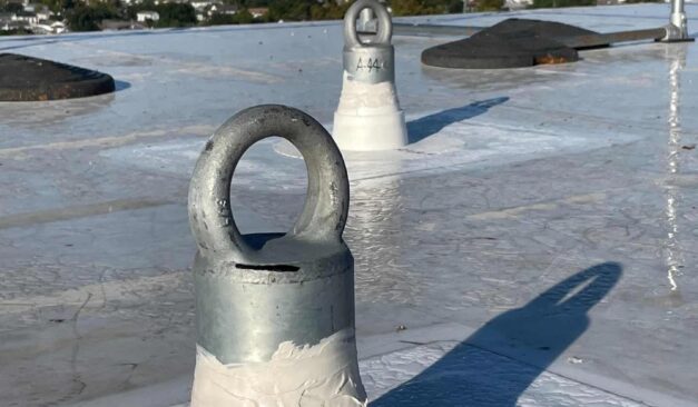 Roof anchor fall protection system installed on industrial rooftop in Ontario for safety and compliance inspections