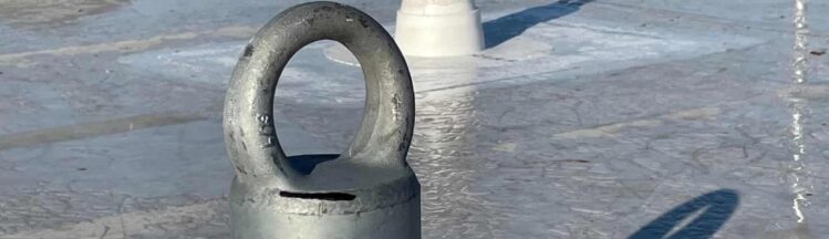 Roof anchor fall protection system installed on industrial rooftop in Ontario for safety and compliance inspections