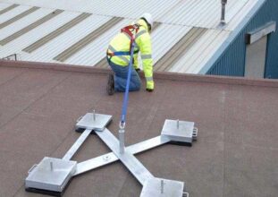 Industrial rooftop fall arrest and travel restraint systems installed for worker safety and compliance in Ontario