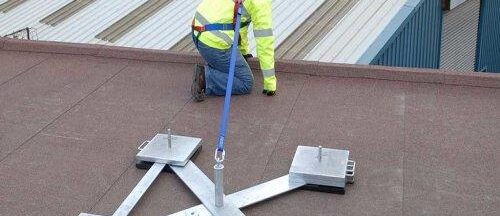 Industrial rooftop fall arrest and travel restraint systems installed for worker safety and compliance in Ontario