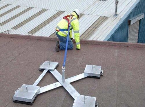 Industrial rooftop fall arrest and travel restraint systems installed for worker safety and compliance in Ontario